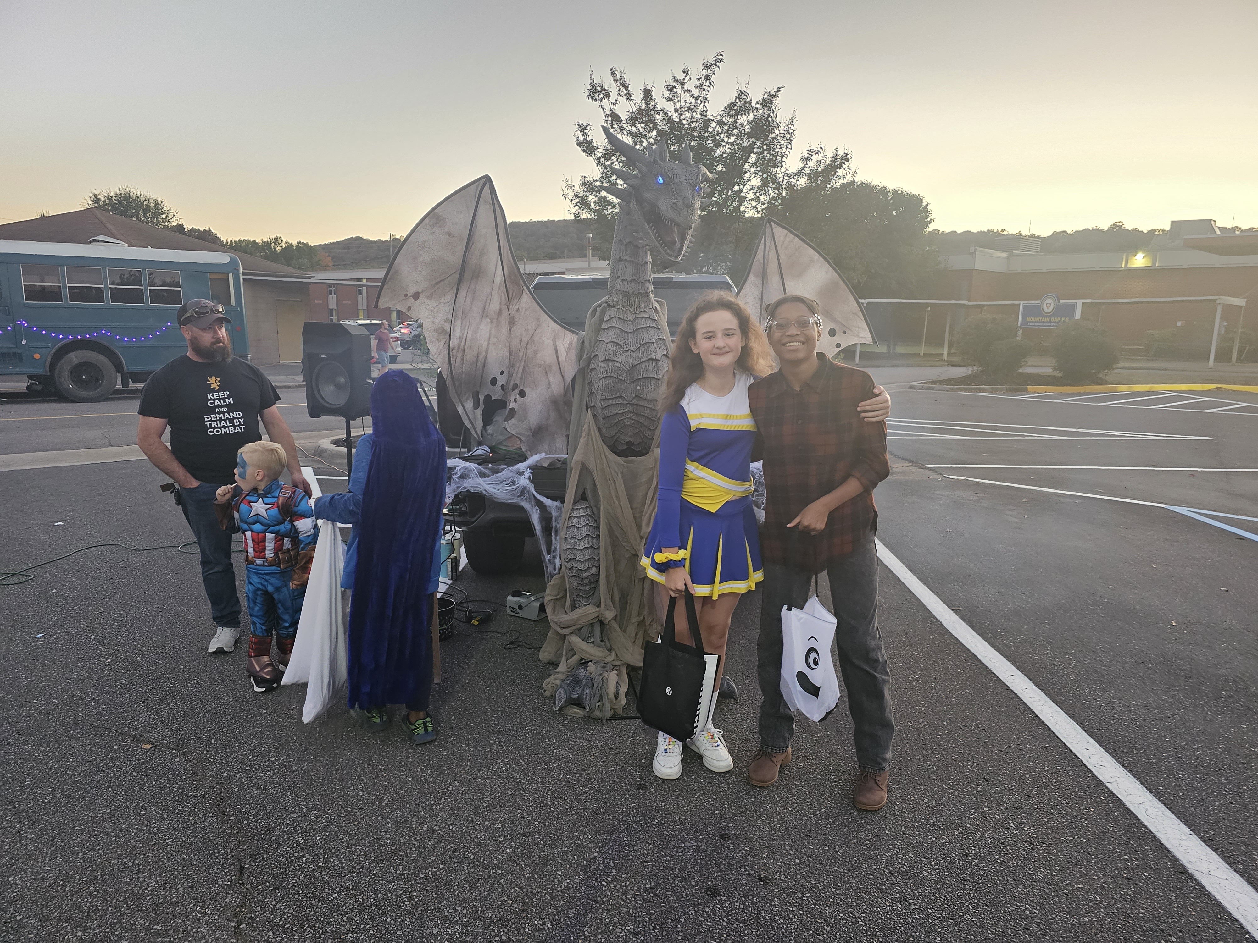 Community members in costume at an outdoor gathering